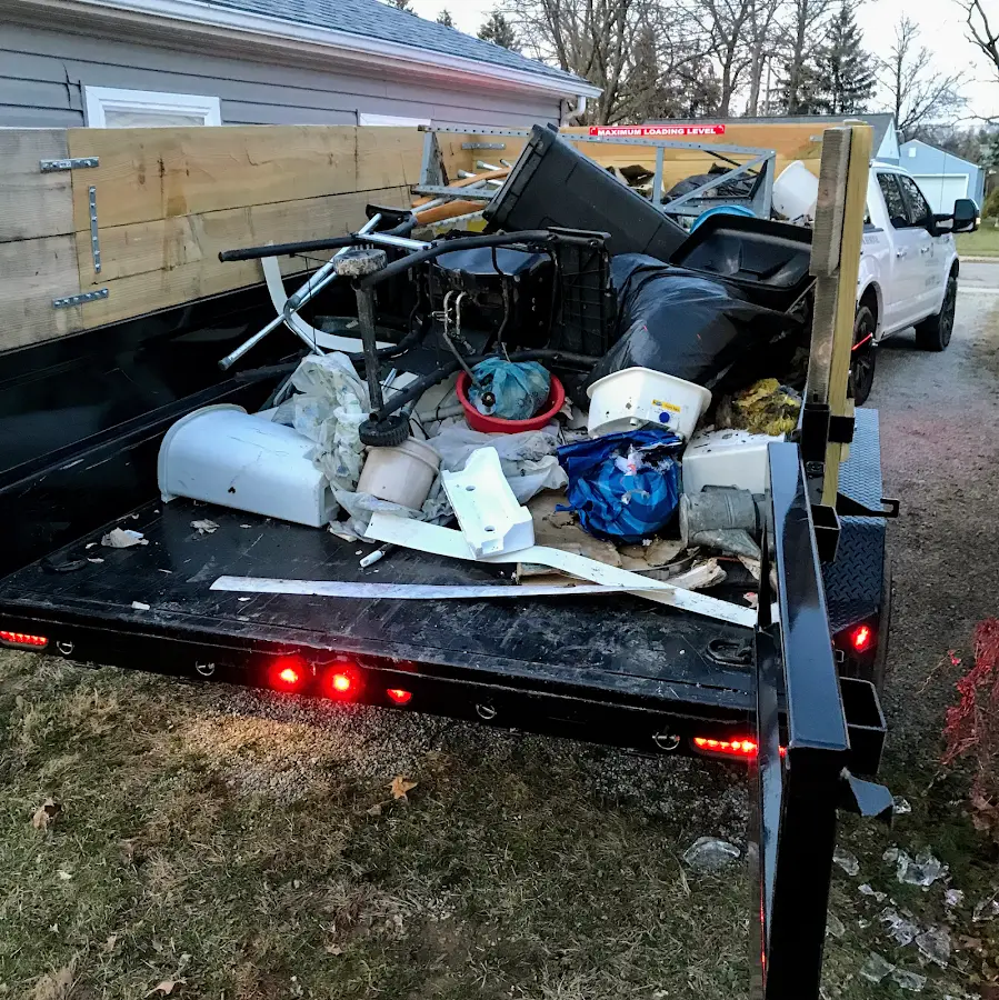 Roll-off dumpster delivered to a residential driveway in Fayetteville